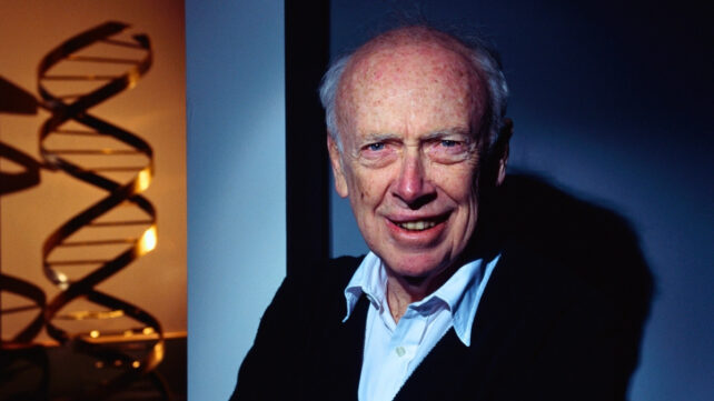 Photo of an elderly man in front of a DNA double helix