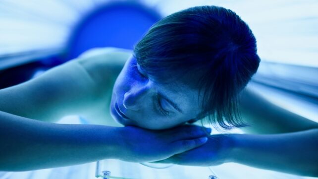 Young person in a solarium