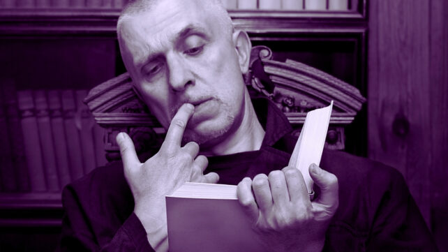 man reading a book